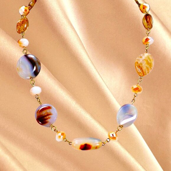 A mix of beige, brown, and off white bead necklace with glass and stone - Picture 13 of 13